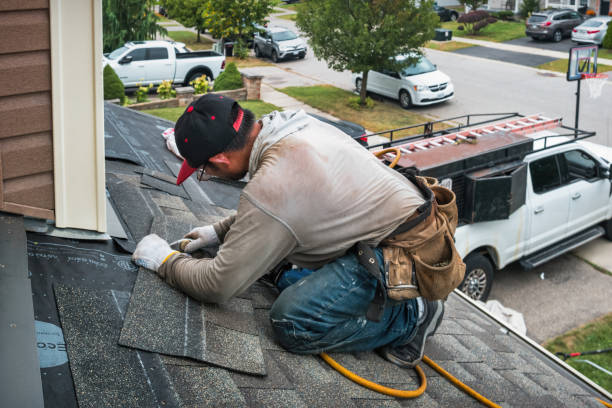 Professional Gutter Installation technician working in Merlin, OR
